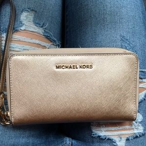 Michael Kors clutch wristlet  in pale gold